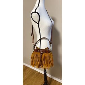 Patricia Nash Elisa two-tone brown leather fringed bucket bag